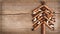 Christmas card with natural decorations on wooden background