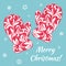 Christmas card: pink mittens with floral tracery on a blue background with snowflakes