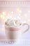 Christmas card with White Mug with Hot Chocolate Cocoa Drink Marshmallows Sparkling lights ornaments