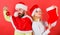 Christmas celebration concept. Christmas stocking tradition. Couple christmas santa costume hold sock and ornament ball