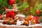 Christmas celebration concept with cup of mulled wine, Christmas cookies, fruit and spices, closeup with selective focus