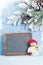 Christmas chalkboard, snowman and fir tree