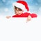 Christmas child kid girl Santa Claus pointing empty banner square snow copyspace