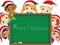 Christmas children around chalkboard