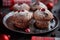 Christmas chocolate delicious muffins served on black ceramic plate