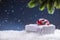 Christmas. Christmas gift box in abstract snowy scene. Christmas time