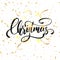 Christmas. Christmas script lettering and shiny gold confetti