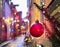 Christmas city evening decoration medieval old town of Tallinn red ball bokeh blurred light at evening street ,holiday travel to E