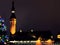 Christmas city market place in Tallinn town Hall Square fireworks , Illuminated tree,night light blurred ,people walking ,New year