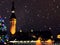 Christmas city market place in Tallinn town Hall Square fireworks , Illuminated tree,night light blurred ,people walking ,New year