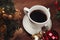 Christmas close-up of Christmas balls and cup of coffee.