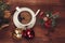 Christmas close-up of Christmas balls and cup of coffee.