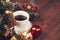 Christmas close-up of Christmas balls and cup of coffee.