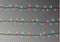 Christmas color lights string. Transparent effect decoration isolated on dark background. Realistic