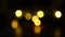 Christmas colored blurred winter background. Bokeh flashlights. Blinking Christmas garland with blurry light. Happy New Year