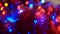 Christmas colorful New Year`s Bokeh neon lights. Abstract Blurred photo background with blinking lights from tangled garlands. Dec