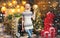 Christmas is coming. Girl in snow. Home interior christmas tree decoration. Woman knitted sweater enjoy christmas