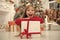 Christmas is coming. Small cute girl received holiday gift. Best christmas gifts. Kid little girl in elegant dress and