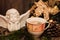 Christmas composition angel, cup of coffee on a dark wooden table