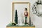 Christmas composition with beautiful decoration, christmas tree and wreath, deer, gifts and accessories in modern home decor.