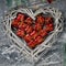 Christmas composition. Christmas gift red boxes in a wicker basket in the shape of a heart, fir branches on a gray aged background
