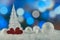 Christmas composition with Christmas tree, Hearts and decorative snowballs against holiday lights background