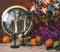 Christmas composition consisting of watches, glasses of champagne with bubbles, decorated Christmas tree, tangerines and