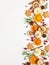 Christmas composition with cookies, dried oranges, cinnamon sticks and herbs on white background. Natural food ingredient for