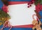 Christmas composition with festive decoration and blank card with copy space. Top view