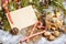 Christmas composition with fir tree branch, envelope, candy cane and tangerines on wooden background. Copy space