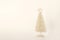 Christmas composition. Golden christmas tree decoration with glitters on Set Sail Champagne color of year 2021 background. Mock