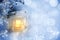 Christmas composition - a lantern with a burning candle under the Christmas tree, copy space, place for text