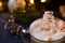 Christmas composition, mug with hot chocolate with melted snowman marshmallows and caramel. close-up, macro on a background of a