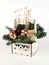 Christmas composition of pine branches, wine corks, balls, apple slices, poppy and chestnuts
