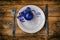 Christmas composition with plate, knife, fork, blue new year ball