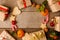 Christmas composition of various gift boxes in craft paper decorated red gold ribbons and holiday sweetness gingerbread cookies