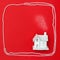 Christmas composition with white toy house with smoke from chimney on red paper background