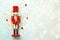 Christmas concept background. Top view of Christmas wooden nutcracker toy solider with space for text