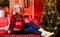 Christmas concept. Child fancy santa enjoy celebration new year. Decor shop. Favorite color. Red style. Spread love