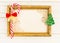 Christmas concept with empty picture frame and cane candy