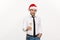 Christmas Concept - Handsome Business man celebrate merry christmas and happy new year wear santa hat with glass of