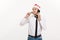 Christmas Concept - Handsome Business man talking on phone and holding glass of champange celebrating Chirstmas and New