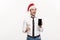 Christmas Concept - Handsome Business man talking on phone and holding glass of champange celebrating Chirstmas and New