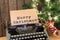 Christmas concept - Typewriter with the inscription and lights