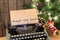 Christmas concept - Typewriter with the inscription and lights