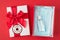 Christmas congratulations. Top above overhead close up view photo of package with lot of medical masks ans antibacterial gel