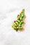 Christmas cookie, glazed christmas tree shape on a snow