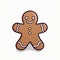Christmas cookies. Brown smiling gingerbread man.