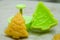 Christmas cookies for children, making gingerbread in shape of fir tree. Raw dough and form for preparation cookie. New year treat