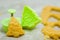 Christmas cookies for children, making gingerbread in shape of fir tree. Raw dough and form for preparation cookie. New year treat